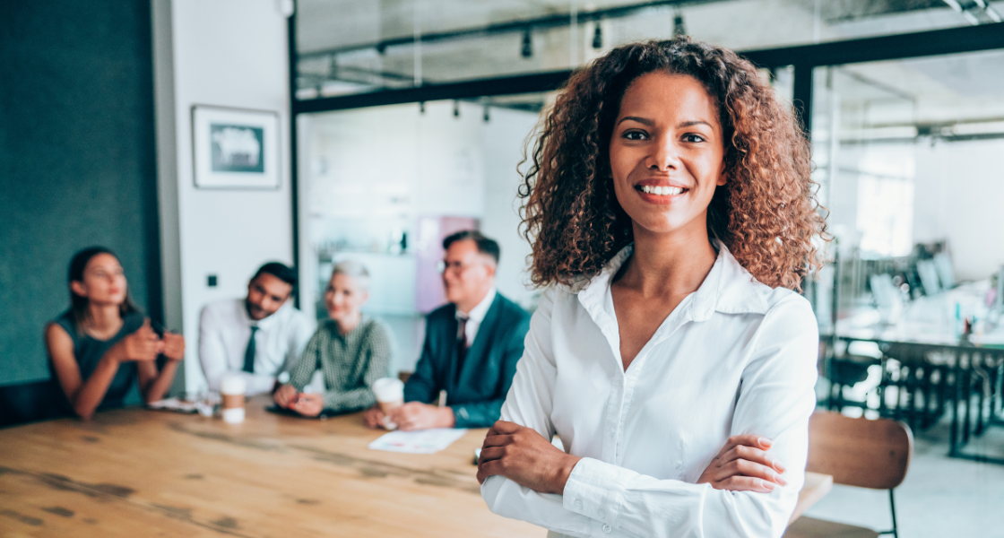 team leader in boardroom meeting executing strategy 